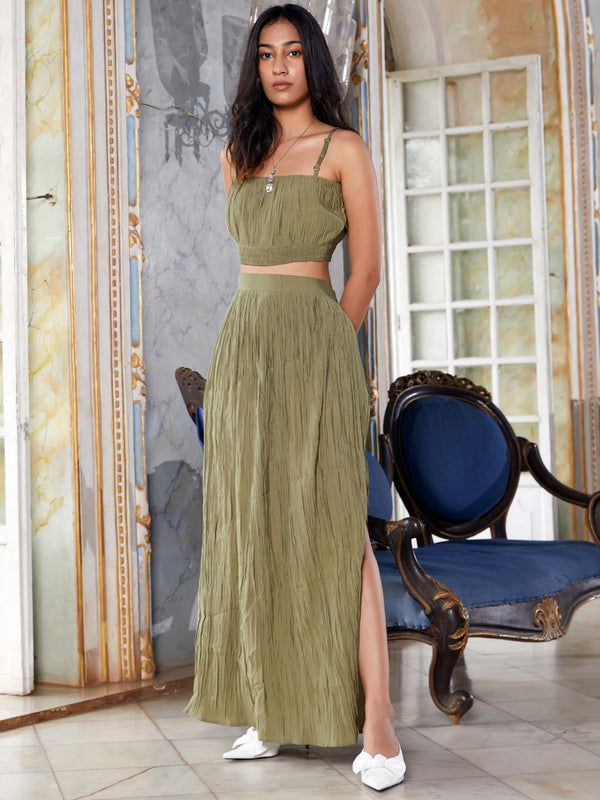 cropped top and flowing skirt with a side slit